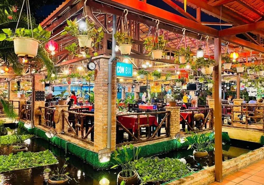 rustic vietnamese village styled interior design at ẩm thực quê nhà restaurant